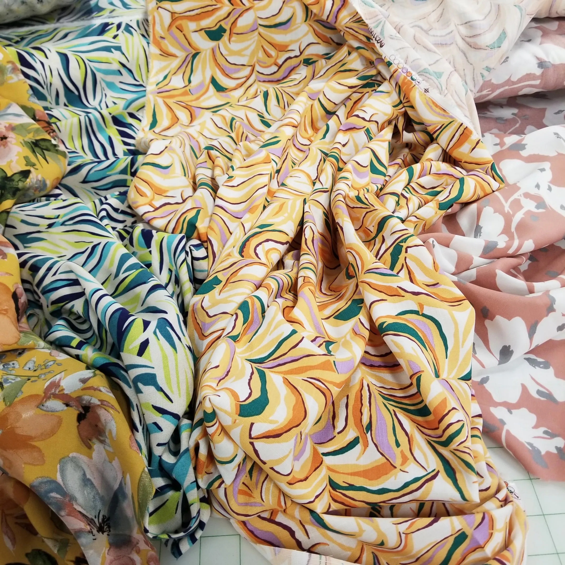 Kahlo Textured Slub Rayon Cream Orange and Green Abstract Resort Wear Print Woven - by the yard
